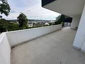 Teilansicht Terrasse - Großzügige 2-Zimmer-Wohnung mit traumhafter Terrasse und Blick über Ransbach-Baumbach