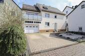 01_Hausansicht - Charmantes Einfamilienhaus mit viel Platz und Charakter in Mengerskirchen-Dillhausen