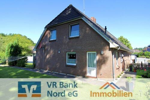 Bild 1 - Gepflegte Doppelhaushälfte mit eigenem Garten - seit Jahren zuverlässig vermietet