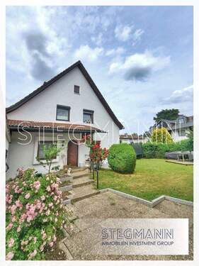 Bild 1 - DHH mit Südgarten in Waldtrudering, Eckgrundstück, Baupotential, Anbau oder Neubau