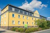 Hausansicht - Erdgeschosswohnung in ruhiger Wohnlage
