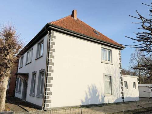 Seitenansicht - Mehrfamilienhaus, Wohnhaus mit 268,00 m&sup2; in Bramsche zum Kaufen
