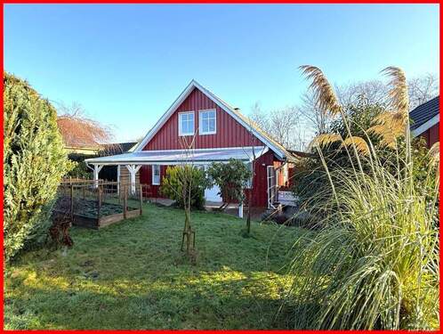 Giebelansicht Westen - Einfamilienhaus mit 150,00 m&sup2; in Loit zum Kaufen