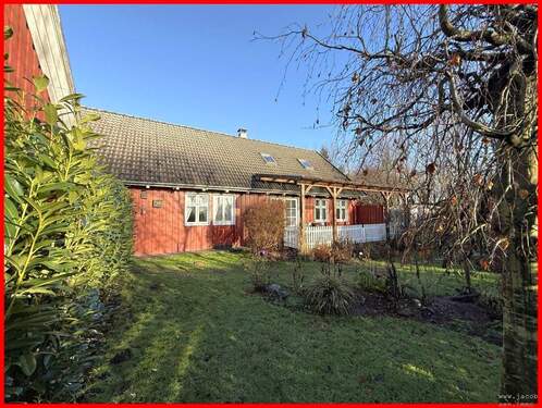 Südansicht mit überdachter Terrasse - 