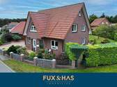 Bild 1 - Einziehen und Wohlfühlen: Einfamilienhaus mit tollem Garten in ruhiger Wohnsiedlung!