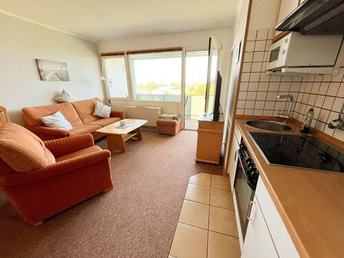 Wohnzimmer mit gr. Loggia - Etagenwohnung mit 40,00 m² in Heringsdorf zum Kaufen