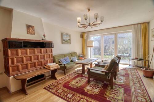 Wohnzimmer mit Kachelofen - 