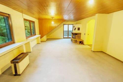 Wohnraum mit Kamin - Etagenwohnung mit 107,00 m&sup2; in Rösrath zum Kaufen