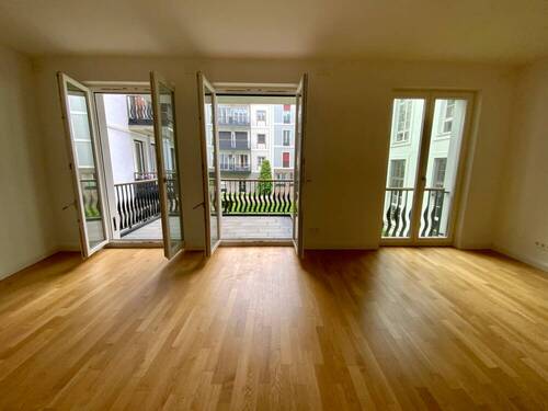 Wohnzimmer - Wohnen zwischen Rhein und KÖ in der Düsseldorfer City in ruhiger Innenhoflage mit EBK und Balkon