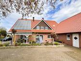 Rückansicht - Mehrfamilienhaus, Wohnhaus mit 262,90 m&sup2; in Hopsten zum Kaufen
