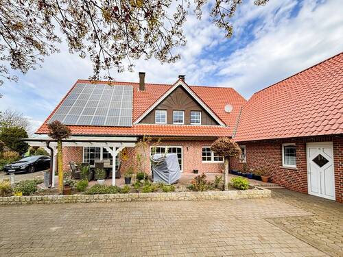Rückansicht - Mehrfamilienhaus, Wohnhaus mit 262,90 m&sup2; in Hopsten zum Kaufen