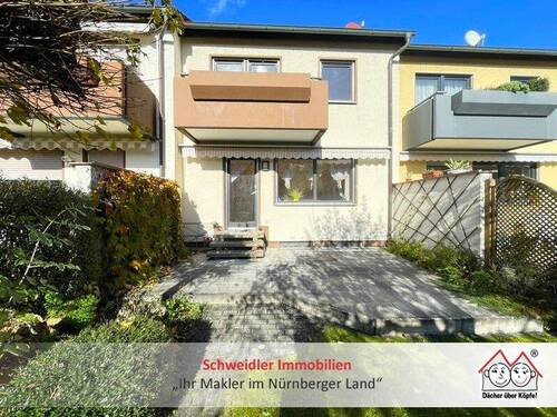 Außenansicht - Traum vom Eigenheim in Eckenhaid! Sonniges Reihenmittelhaus mit Garage in Eckental