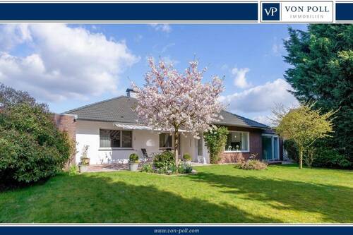 Titelbild - Ebenerdiges Wohnglück: Top-gepflegte Immobilie für gehobene Ansprüche