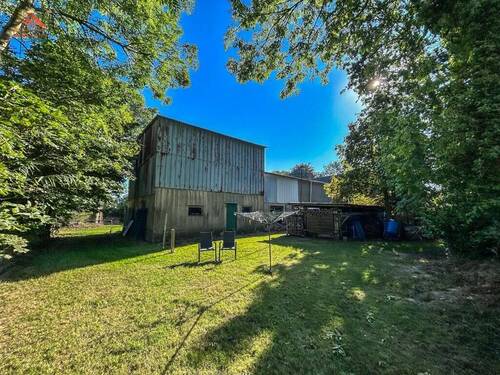 Hausansicht 4 mit Scheune - Einfamilienhaus mit 174,30 m&sup2; in Wurster Nordseeküste zum Kaufen