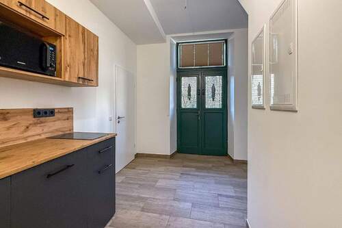 Küche/Zugang in den Innenhof - 