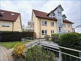 Haus - Gemütliche 3 Zi.-Erdgeschosswohnung mit Gartenanteil und PKW-Stellplatz!