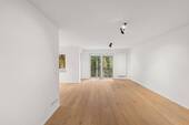 Wohnzimmer - Exklusiv modernisierte 4-Zimmer-Wohnung mit Balkon in ruhiger Wohnlage - Erstbezug