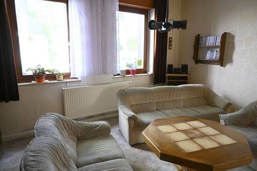 Wohnzimmer - 9 Zimmer Einfamilienhaus zum Kaufen in Essen / Steele