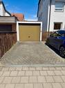 Garage und Aussenstellplatz - 