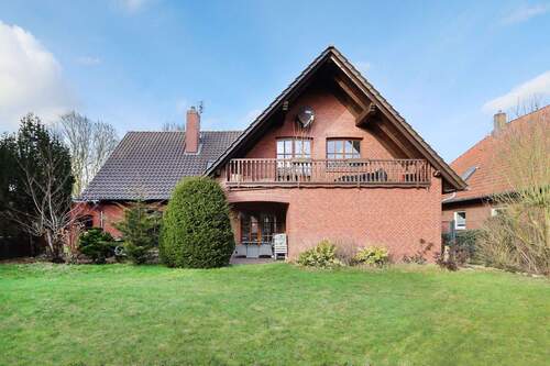 Gartenansicht - 8 Zimmer Einfamilienhaus zum Kaufen in Lohne