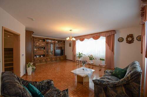 Wohnzimmer - Doppelhaushälfte mit 145,00 m&sup2; in Friesoythe / Edewechterdamm zum Kaufen