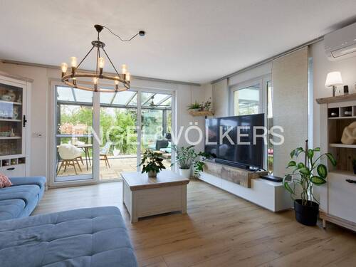 Wohnzimmer mit anschließendem Wintergarten - Reihenendhaus mit 155,00 m&sup2; in Rosbach vor der Höhe zum Kaufen