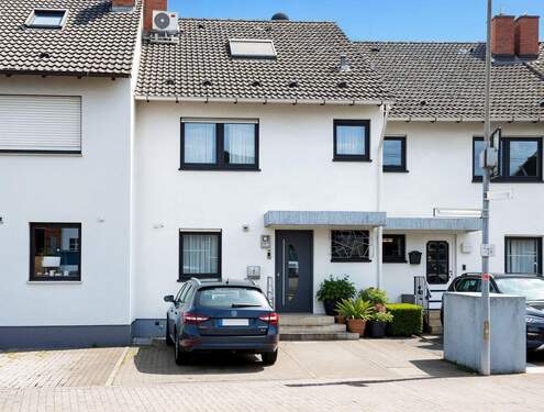 Ansicht - (KI generiert) - Gepflegtes Reihenmittelhaus mit Garten, Garage und Ausbaupotenzial in Ketsch