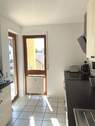 Küche mit Zugang zum Balkon - 
