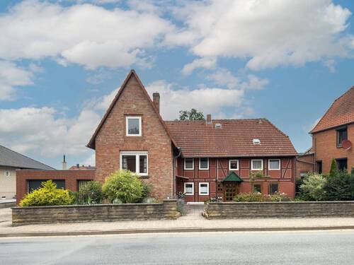 Straßenperspektive - Einfamilienhaus mit 182,00 m&sup2; in Ilsede zum Kaufen