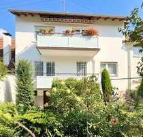 Viel Platz für Ihre Wohnideen - Ein- bis Zweifamilienhaus mit Garten und zwei Garagen in Wiesloch