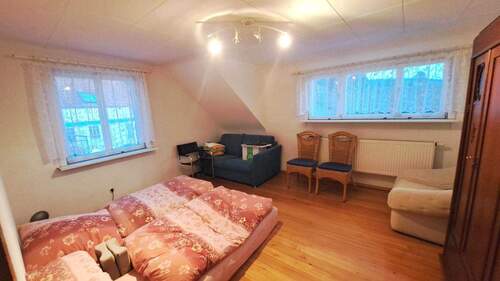 Schlafzimmer im Dachgeschoss - 