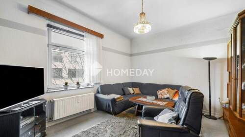 Wohnzimmer 1 - 4 Zimmer Etagenwohnung zum Kaufen in Köln