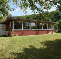 RESERVIERT! Ihr kleines Paradies: Kompakter Bungalow auf idyllischem Grundstück - Weilrod Mauloff