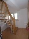 Treppe vom Eingang zu Wohnen - 