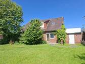 Gartenansicht - Erdgeschosswohnung mit Garten in Hooksiel