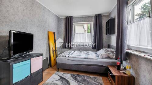 1. OG Schlafzimmer 1 - 