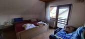 Schlafzimmer 2 Dachgeschoss mit Balkon - 