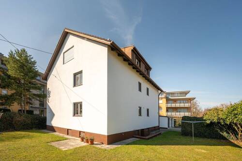 Hausansicht - 1 Zimmer Mehrfamilienhaus, Wohnhaus zum Kaufen in Unterschleißheim