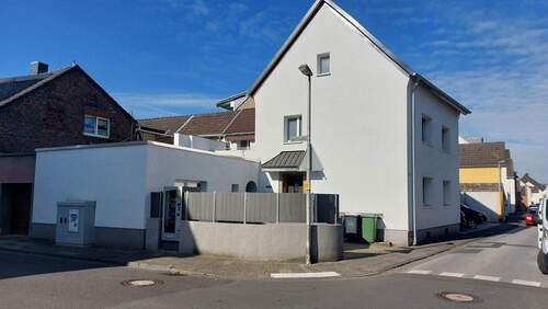 Bild 2 - 7 Zimmer Mehrfamilienhaus, Wohnhaus zum Kaufen in Dormagen