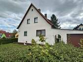 Giebelansicht mit Garage - Einfamilienhaus mit 115,00 m² in Dormitz zum Kaufen