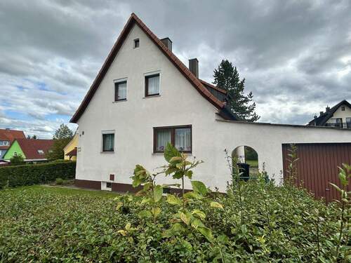 Giebelansicht mit Garage - Einfamilienhaus mit 115,00 m² in Dormitz zum Kaufen