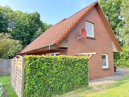 Seitenansicht - 6 Zimmer Mehrfamilienhaus, Wohnhaus in Großenkneten