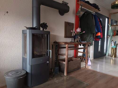 Eingangsbereich mit Ofen - 