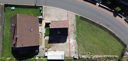 Zweifamilienhaus mit Garage neben Baugrundstück - Grundstück zum Kaufen in Kist