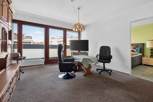 Einblick Wohnzimmer - Etagenwohnung mit 66,20 m&sup2; in Karlsruhe zum Kaufen