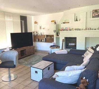 Kuschelecke mit Kaminofen im Erdgeschoss - 