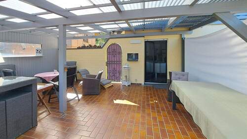 Überdachte Terrasse im Erdgeschoss - 