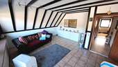 Weiteres Zimmer Dachgeschoss mit Zugang zum Balkon - 