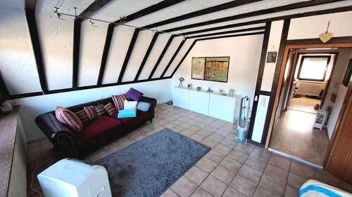 Weiteres Zimmer Dachgeschoss mit Zugang zum Balkon - 