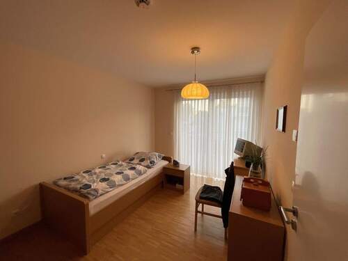 Schlafzimmer mit Balkon - 